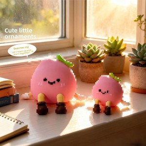 Cute Peach Plastic Squeeze Figurine Car & Desk Creative Decor Stress-Relief Student Gift